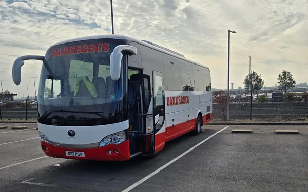 A Barker Bus coach on an airport transfer