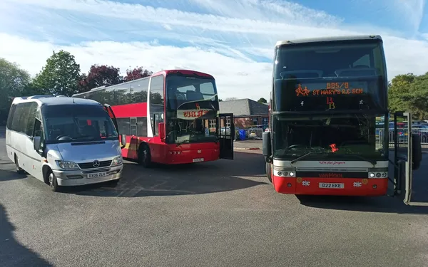 Barker Bus vehicles at St Mary's, one showing the school on its destination blind