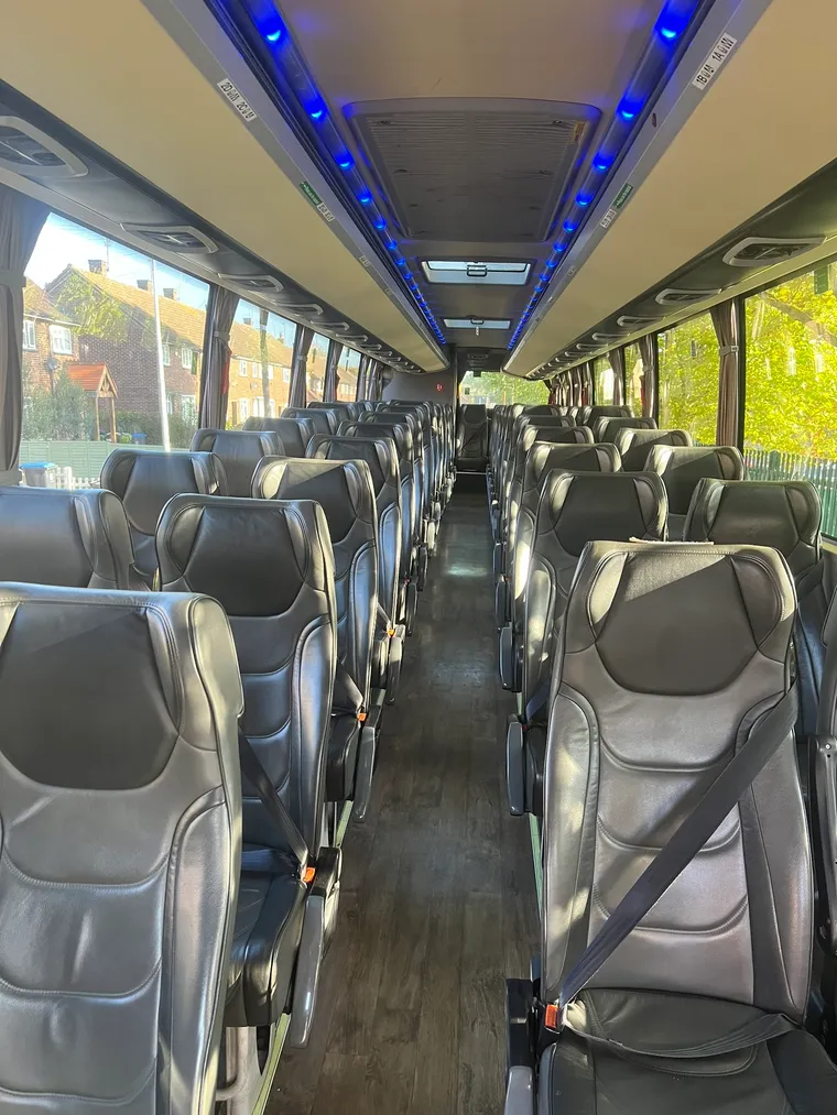 Interior of a Barker Bus executive coach, reclining leather seats with belts